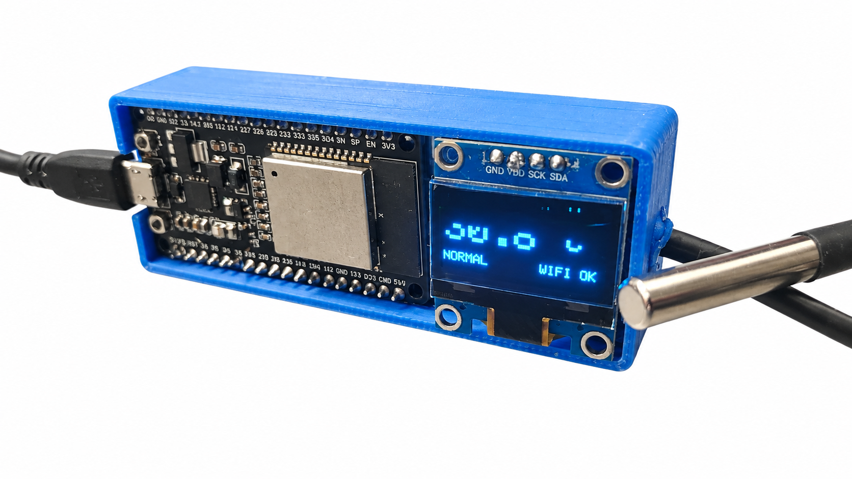 The cover removed, revealing the ESP32 board, OLED module and temperature probe beside the printed base.
