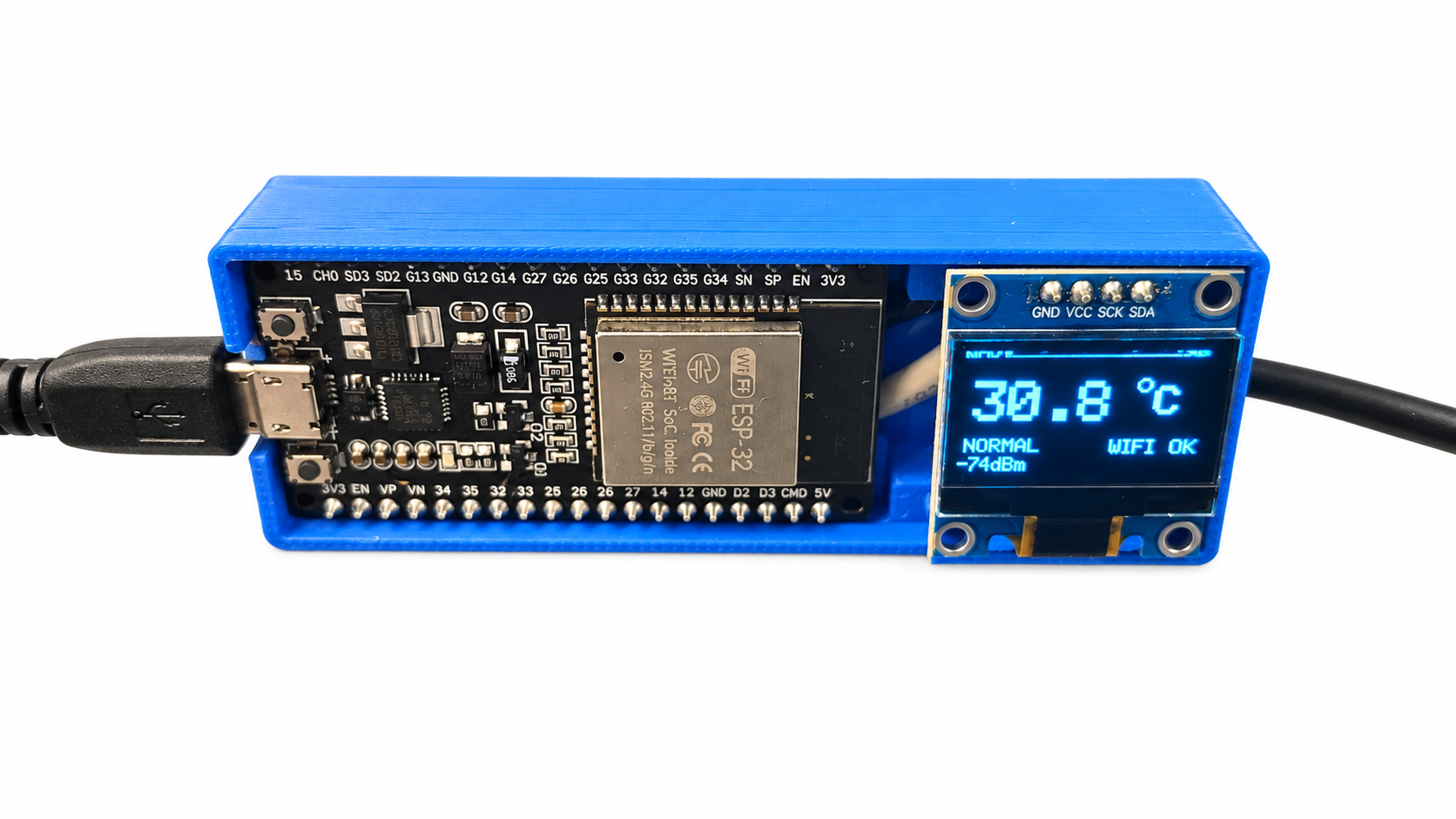 Close product view of the OLED showing temperature and Wi-Fi status.