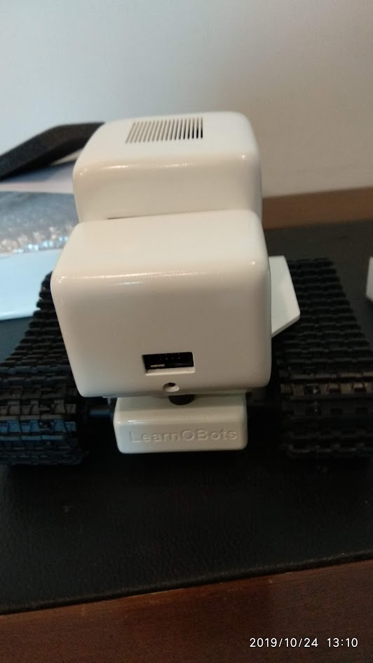 Buddy Bot rear view showing LearnOBots branding and USB connectivity